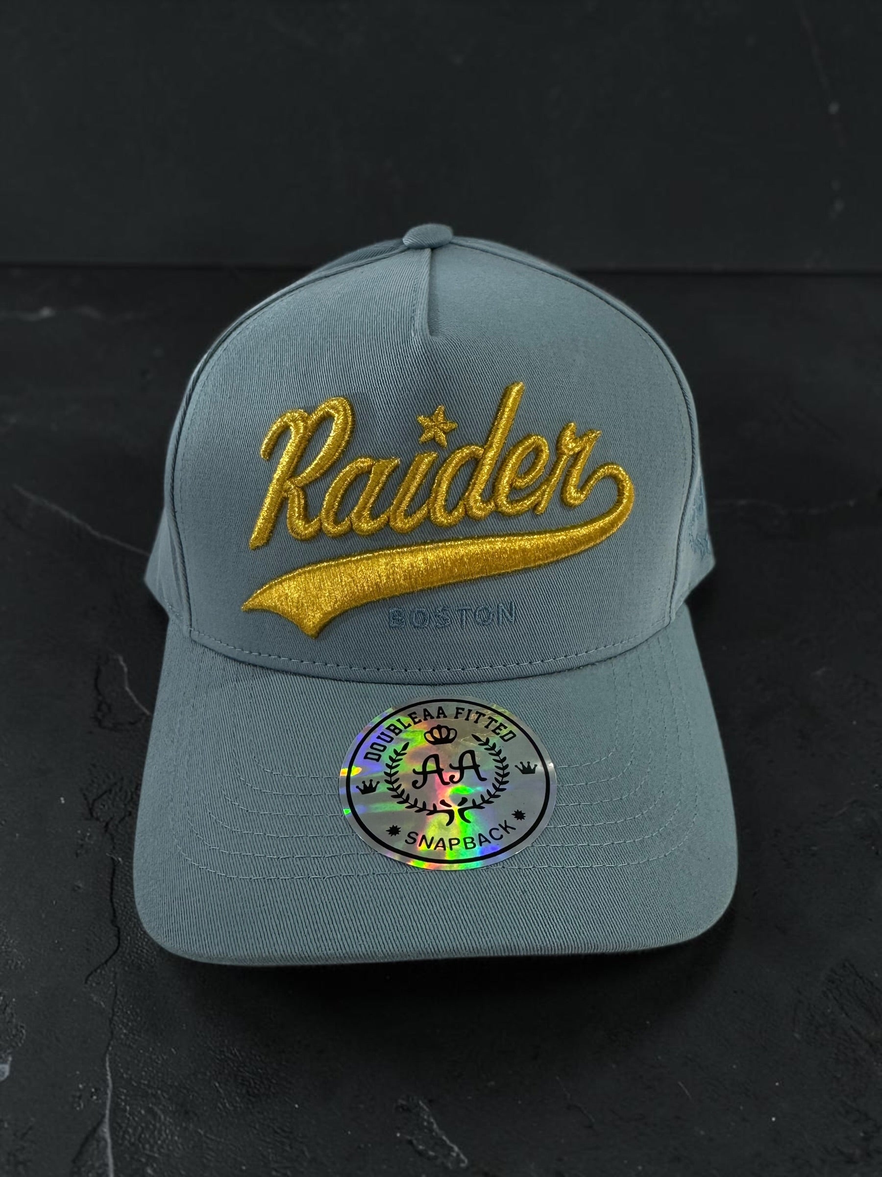 Light blue Raider Boston Gold Edition